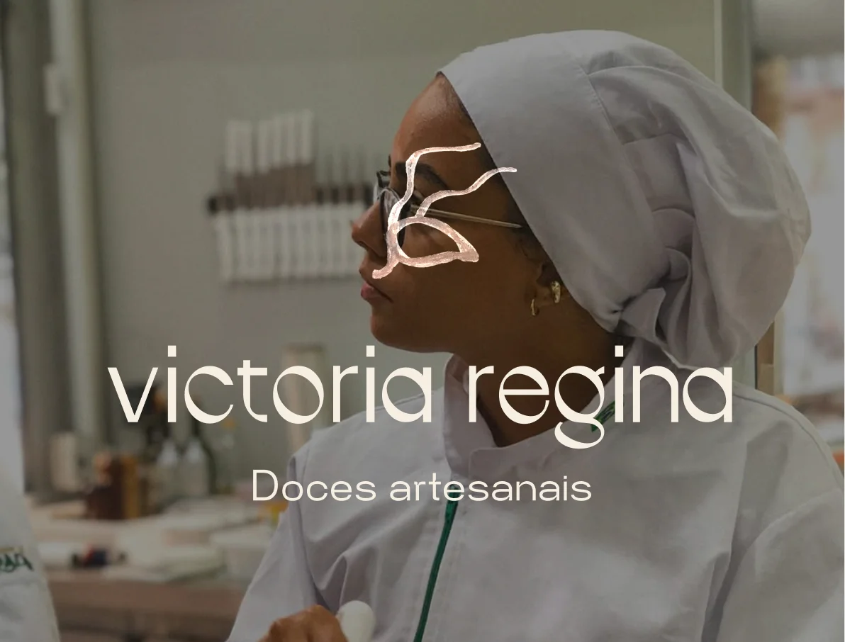 Victoria whisking a bowls in a professional kitchen.
