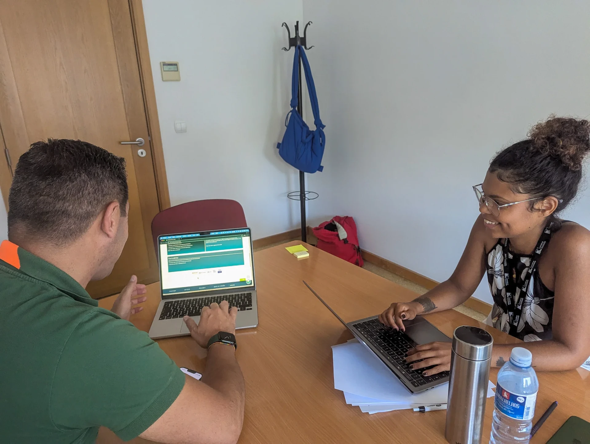 Mariane conducting an interview with another person.