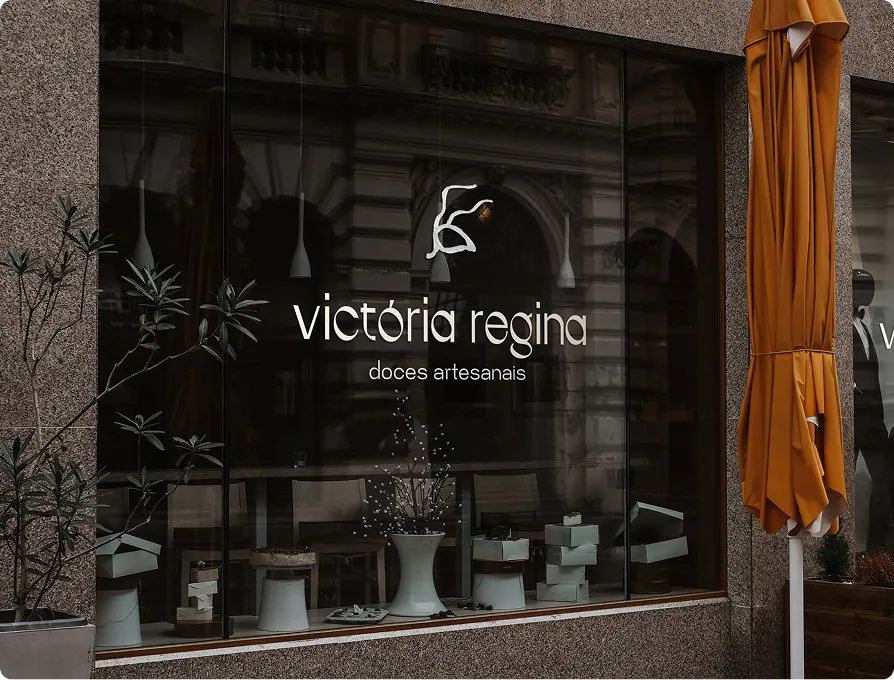 pastry shop window with logo of Victoria Regina brand.